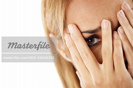closeup of worried caucasian woman on white background. Horizontal shape, headshot