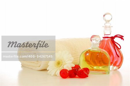 bottle with massage oil isolated on white background