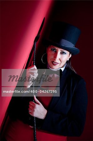 Woman dressed like a circus ringmaster