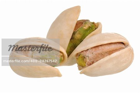 Pistachios in close-up isolated on white background