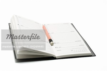 Pencil  and Pocket Planner on White Background
