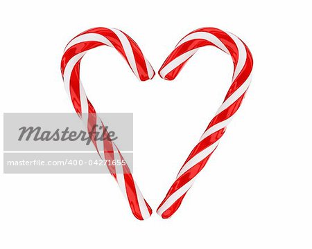 Heart made from christmas candies isolated on white background