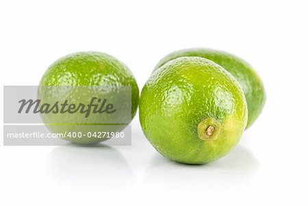 ripe brazilian limes isolated on a white background