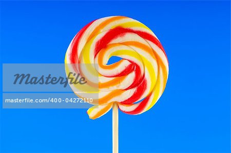 Colourful lollipop against the colourful background