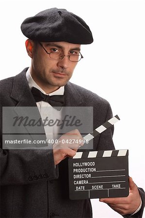 Old fashioned man holding movie clapboard