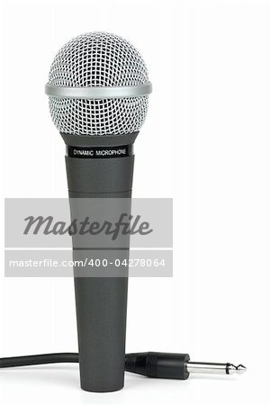 Professional dynamic microphone and cable with jack near  isolated on the white background
