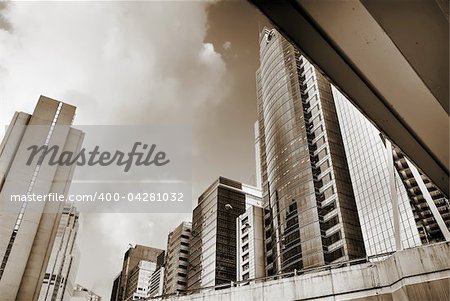 Cityscape with tall buildings and skyscrapers in modern city.