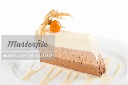 tiramisu dessert with ground-cherry closeup on a white