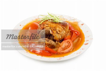 knuckle of veal with vegetables isolated on a white