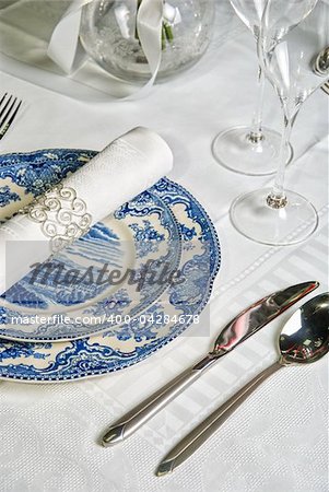 Holiday place setting with napkin, fork and knife