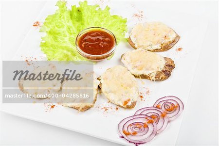 Baked beef tongue with cheese and vegetable on white background