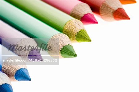 Collection of colorful pens over white background