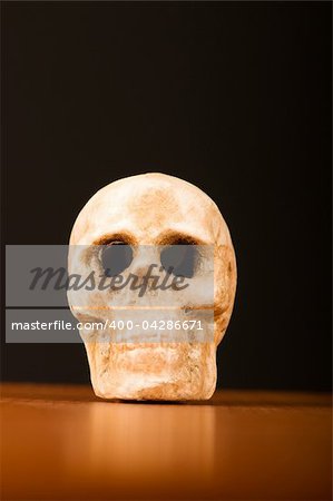 Skull of human against the gradient background