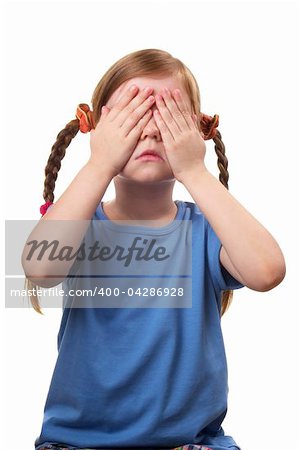 Little girl with eyes closed by her hands isolated over white background