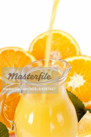 Fresh orange juice in a glass jug