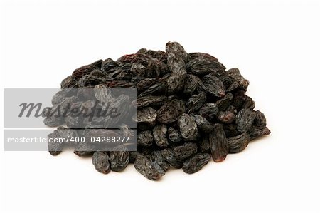 Black raisins isolated on the white background