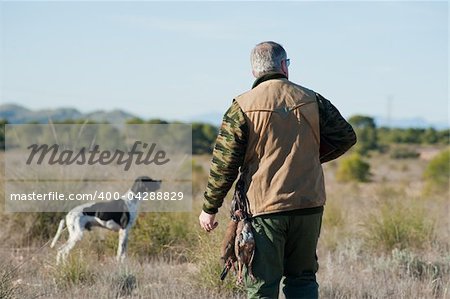 A hunter and his dog, a strong parntership