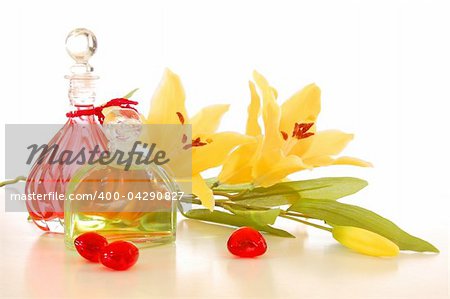 bottle with massage oil isolated on white background