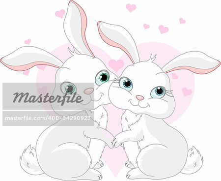 Two very cute white Bunnies in love