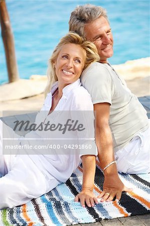 Happy mature couple outdoors.