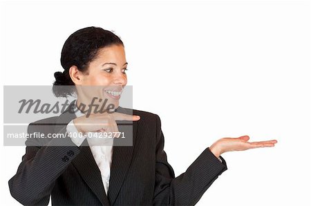 woman points with finger at palm with space for advertisement. Isolated on white background.