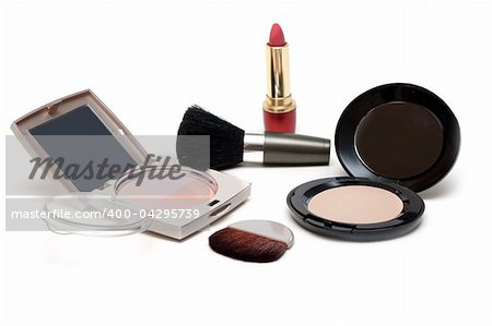 Set of the make-up with mirror on white background
