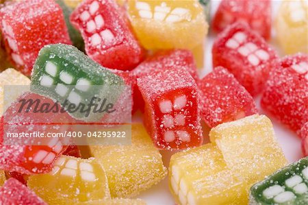 background of delicious sweet candies in sugar