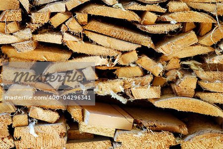 Pile of wooden logs and sticks for ecological heating