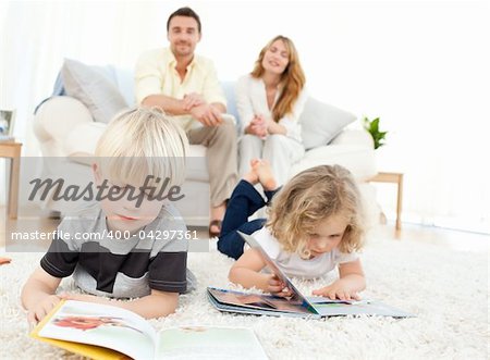 Childrens reading books in the living rooms