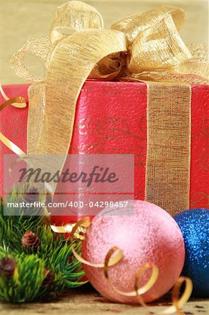 Christmas gift box with golden bow