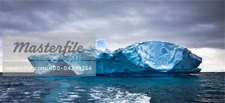 Huge iceberg in Antarctica, beautiful winter background