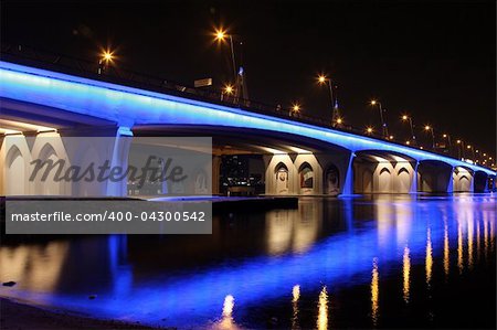 The Business Bay Crossing in Dubai crosses the Creek and is illuminated at night