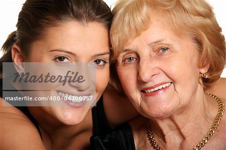 A portrait of a granddaughter hugging her grandma over white background