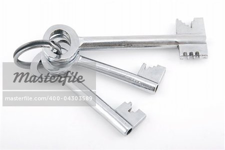 silver bunch of keys on white background