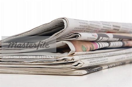 newspaper stack on white background, information concept