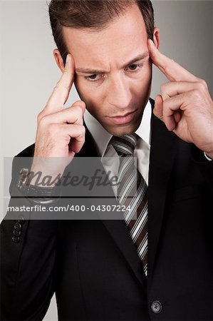Young Businessman Is Thinking Hard to Solve Problems