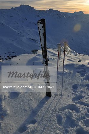 mountain snow ski with beautiful sunset in background