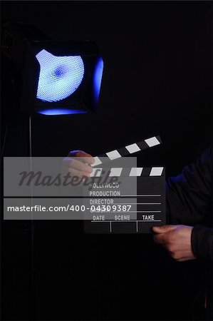 Movie concept. Movie clapper board in action