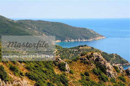 A Typical Italian Seascape With Hills And Indented Coastline