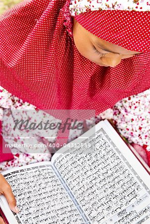 Child Reading Koran