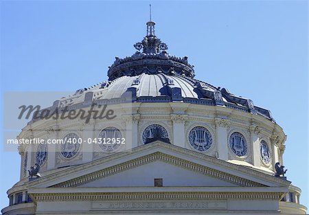 Detail of the upper part of the Romanian Atheneum from Bucharest.Under the roof there are the names of some important musicians,writers and philosophers of the world.