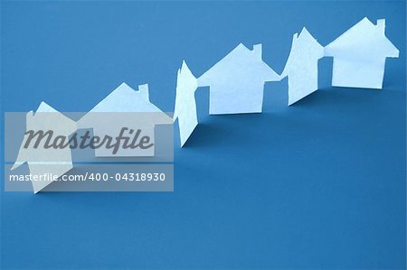 paper houses or homes showing a concept for real estate