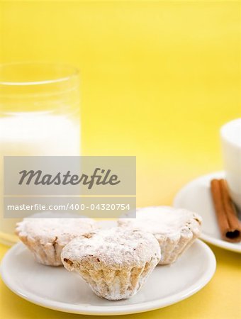 cookies and milk on a yellow background