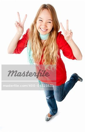 beautiful smiling teenage girl making victory sign with both of her hands, smiling and looking into the camera with her eyes almost closed. Isolated on white background