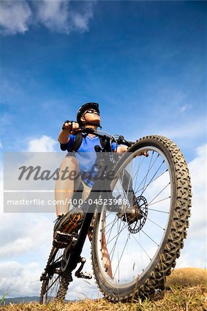 Mountain Biker and blue sky background