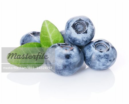 Blueberries and two leaves isolated on white background