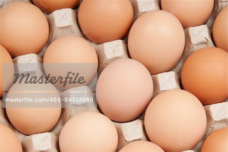 many brown eggs, background