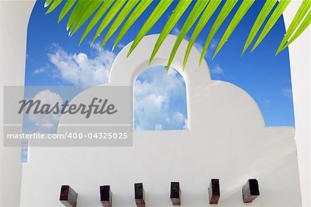 Mexican architecture white archs blue sky in Mayan Riviera