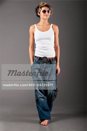 woman wearing white tank top and jeans