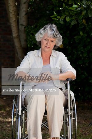 Smiling woman in her wheelchair